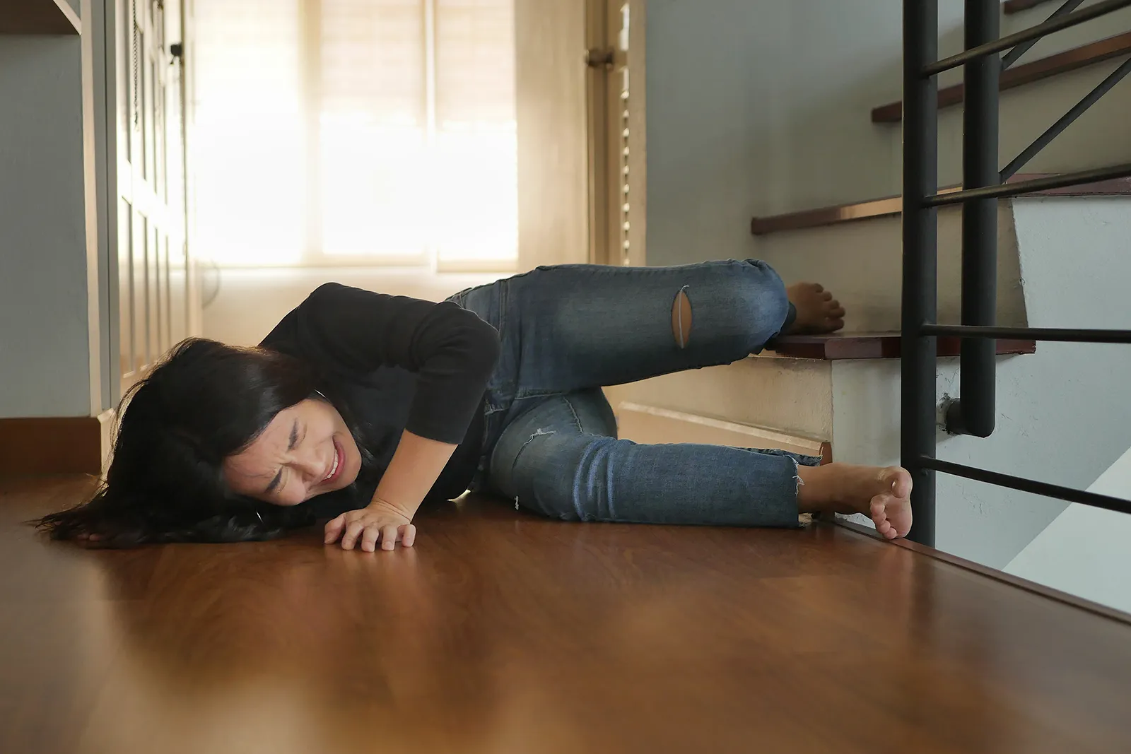 A woman that has fallen down