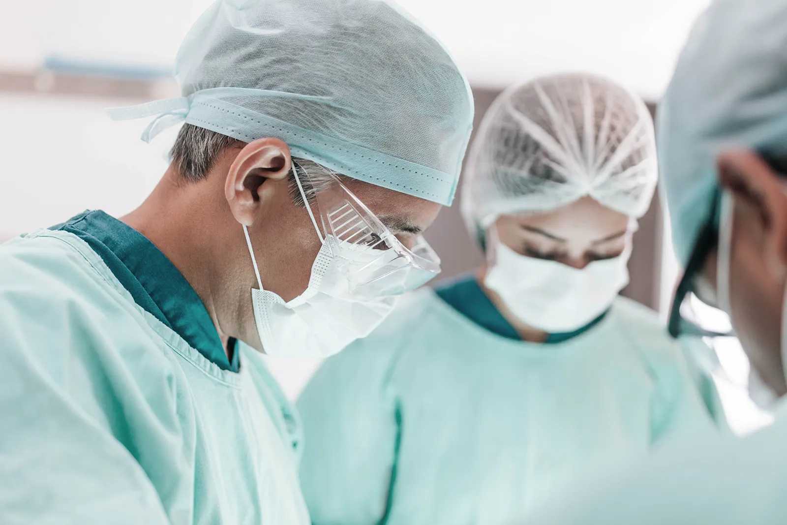 Surgeons wearing masks